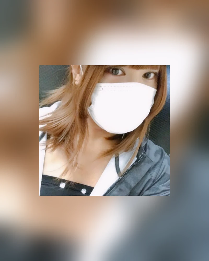 Profile photo of amu: a masked selfie in a grey zip-up hoodie
