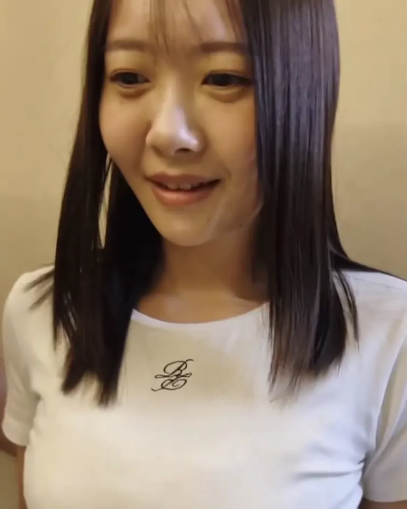 Woman in a white T-shirt, from a Gendai Shudan video
