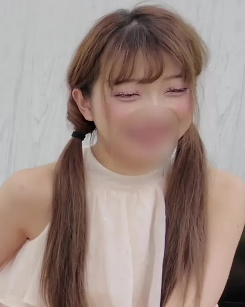 Clothed still from an Ura Sakusei Joshi production (face blurred)