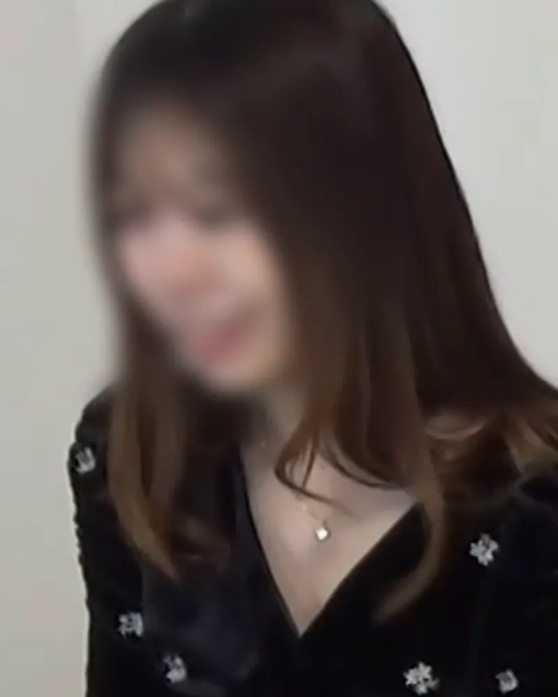 Clothed still from a Majiko production (face blurred)